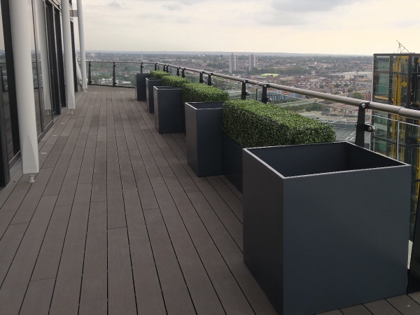 Bespoke metal planters on a roof terrace