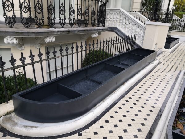 Curved bespoke metal planter