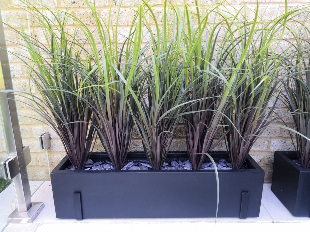Artificial grasses in polystone window box London Planters